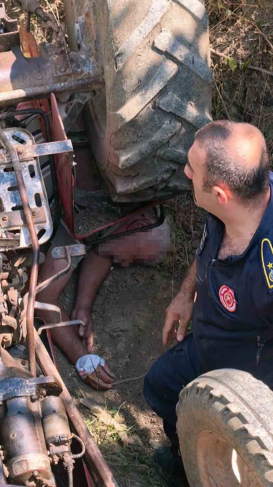 Traktörün altında kalan adam ağır yaralandı